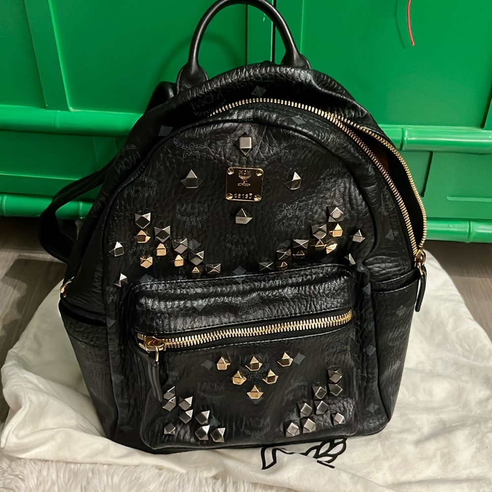 Authentic MCM leather black back pack with studs. This is the original bag